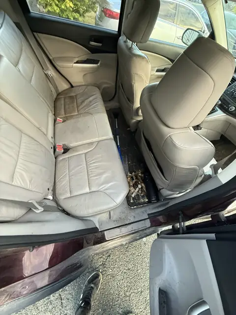 Maroon SUV, leather interior refresh