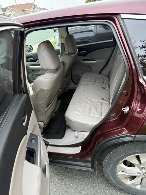 Maroon SUV, leather interior refresh