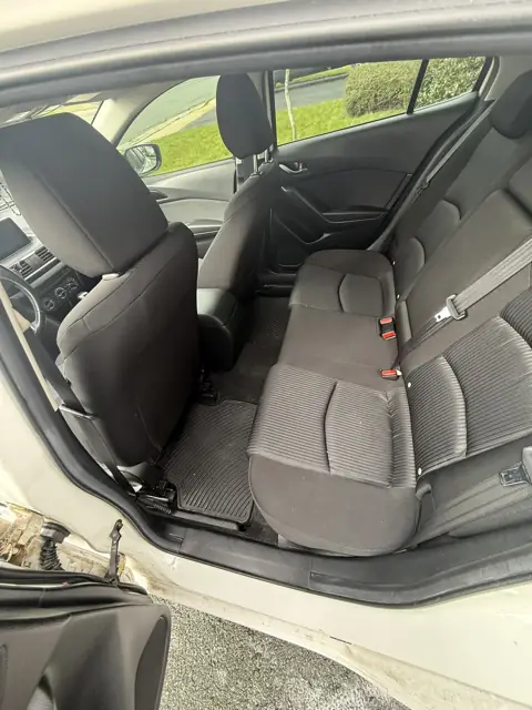 White hatchback, inside and out