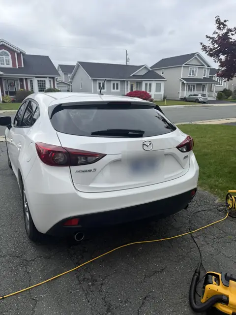 White hatchback, inside and out