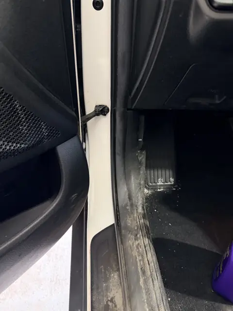 White crossover, cargo area, door panels and jambs